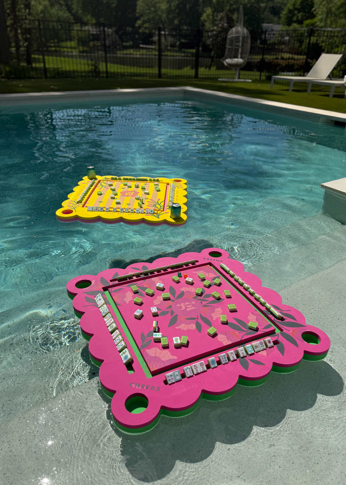 Neon floral pink floating mahjong tile mat with tile layout and four corner pegs