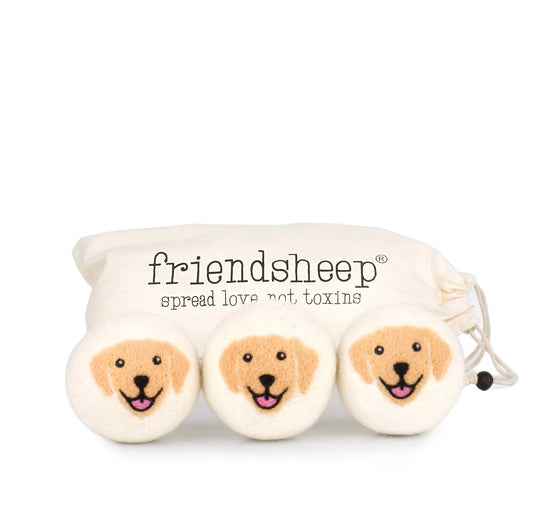 Cream plush pouch with three smiling dog faces and drawstring closure