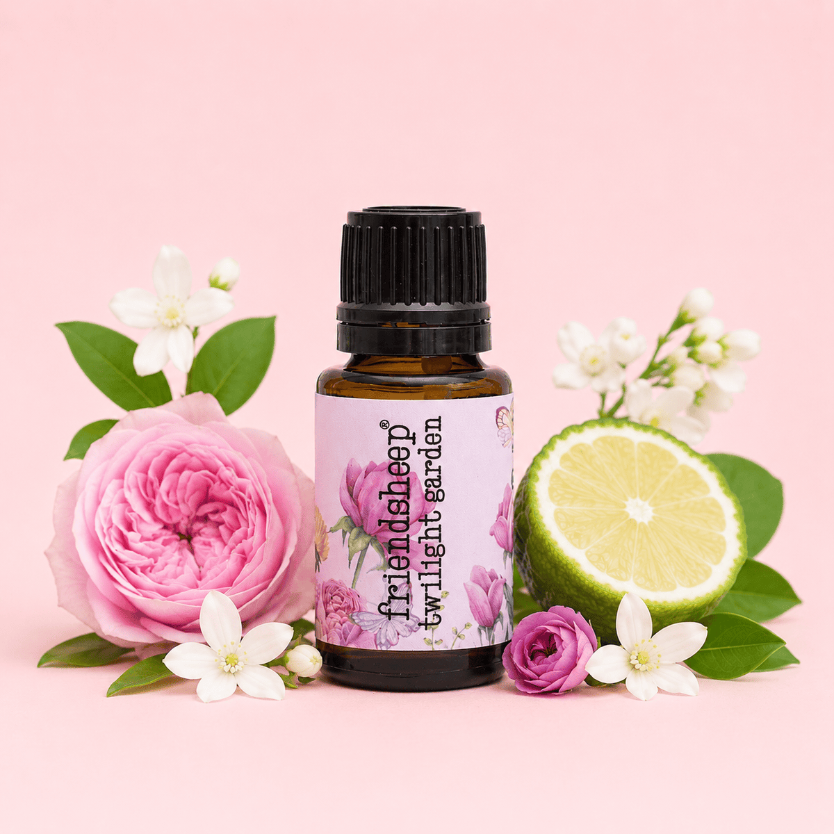 Amber essential oil blend bottle with black cap and floral label.