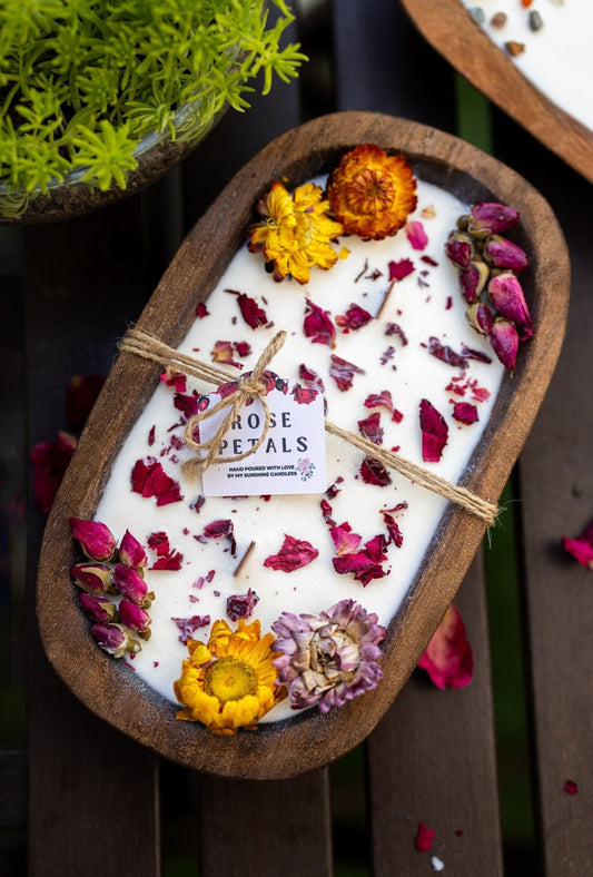 Framed wooden dough bowl soy candle with rose petals and tied wick label