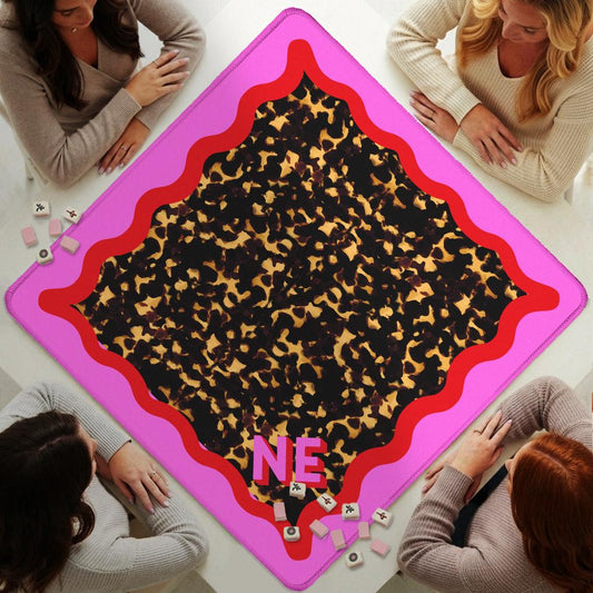 Custom Monroe mahjong mat with black and gold animal print, red scalloped border and pink trim