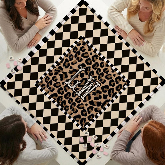 Mahjong mat with a leopard-print center and cream-and-black checkerboard border