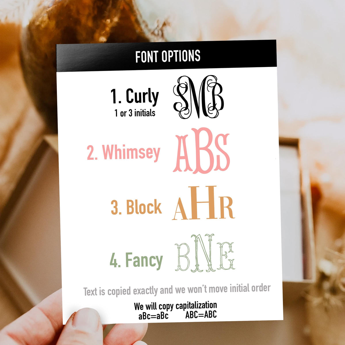 Custom mahjong mat font options card showing four styles for initials