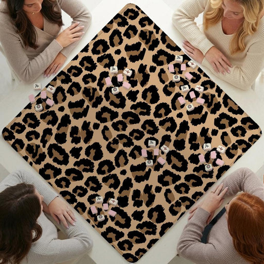 Leopard-print mahjong mat laid out for play with tiles