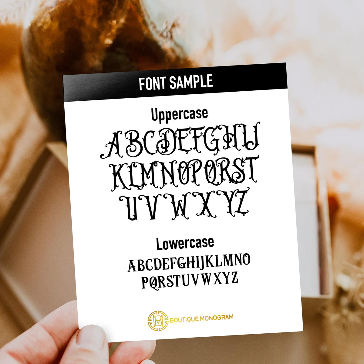 Font sample card showing uppercase and lowercase decorative lettering for custom mat initials.