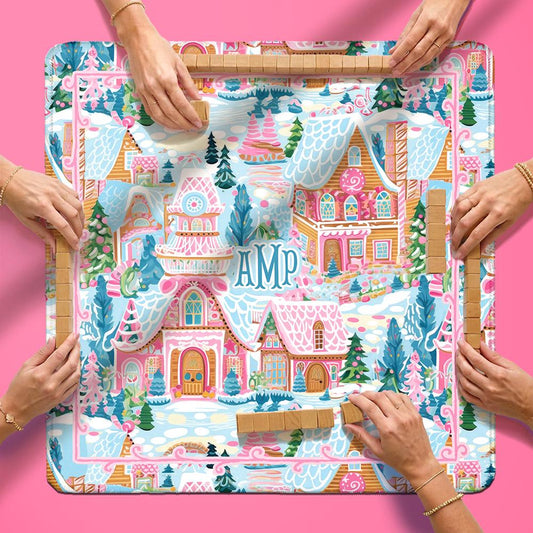Christmas mahjong mat with a sugar plum village print and four wooden tile racks
