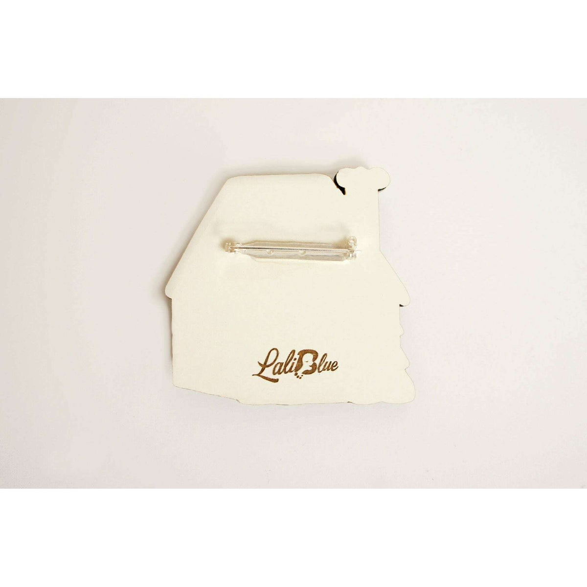 Laliblue back of gingerbread house brooch with safety pin and brand logo