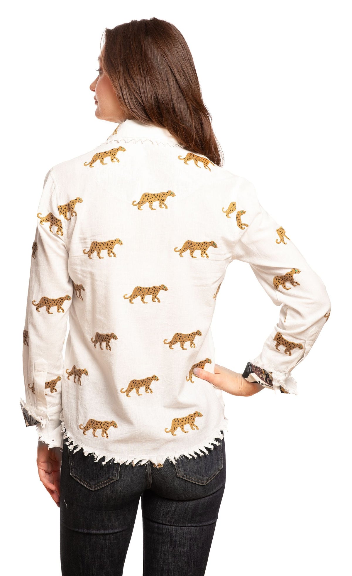 Ivory cheetah-embroidered button-up top, back view with ruffled hem