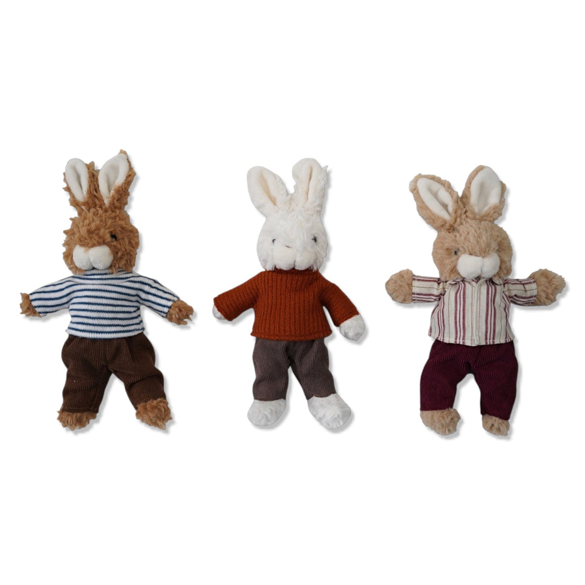 Three plush bunny toys in outfits: striped shirt, orange sweater, striped shirt