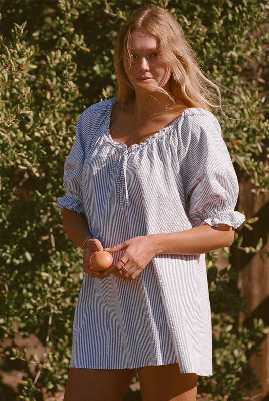 Blue-and-white pinstripe seersucker mini dress with puff sleeves and square neckline