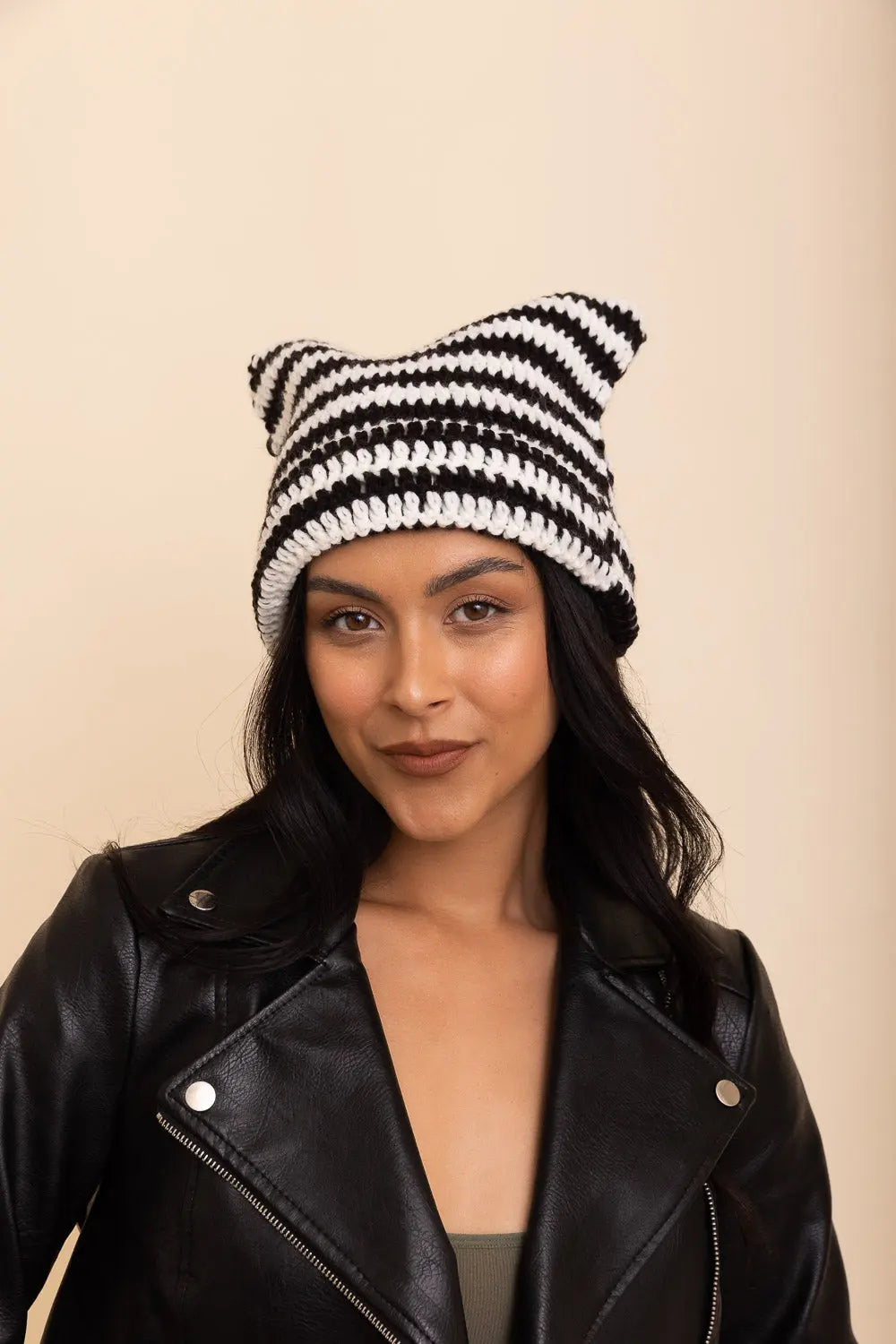 Black and white striped cat-ear crochet beanie with cat ears, front view