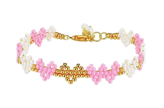 Pink and white heart beaded bracelet with gold heart centerpiece and clasp