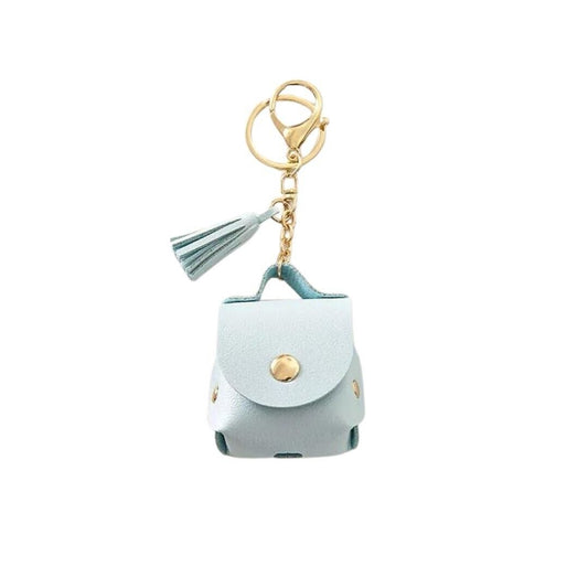 Light blue faux leather AirPods case keychain with tassel and gold clasp