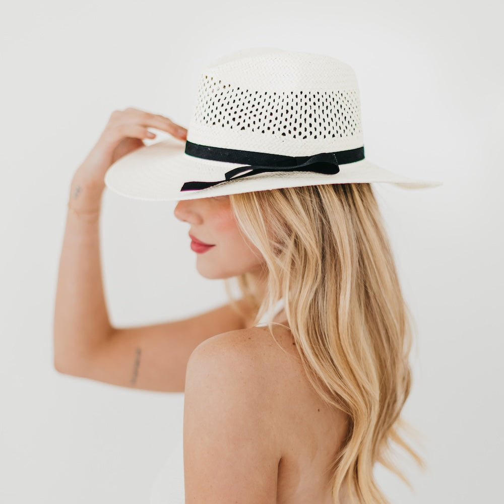 White perforated western sun hat with wide brim and black band