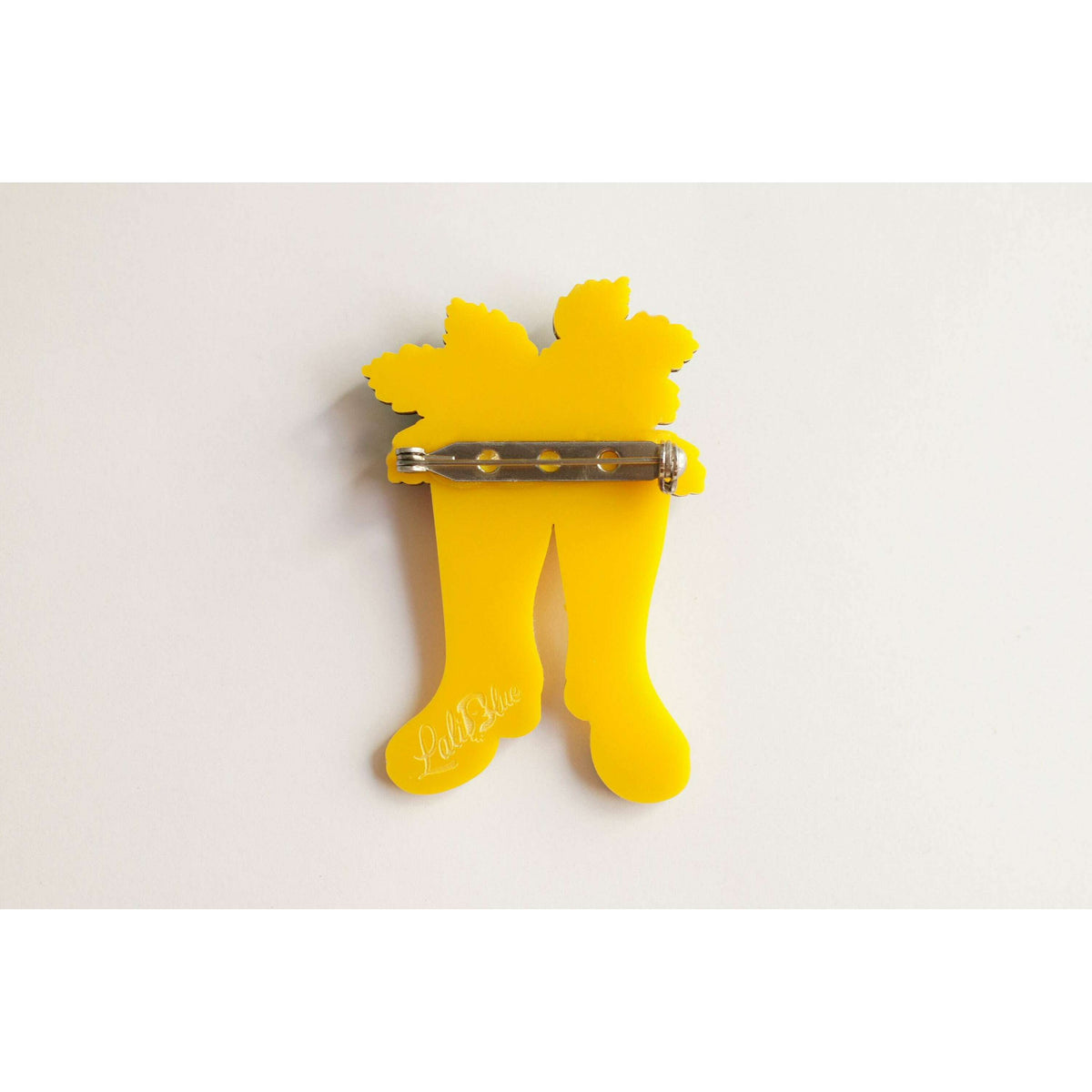 Yellow boot brooch back with gold-tone pin and bar clasp