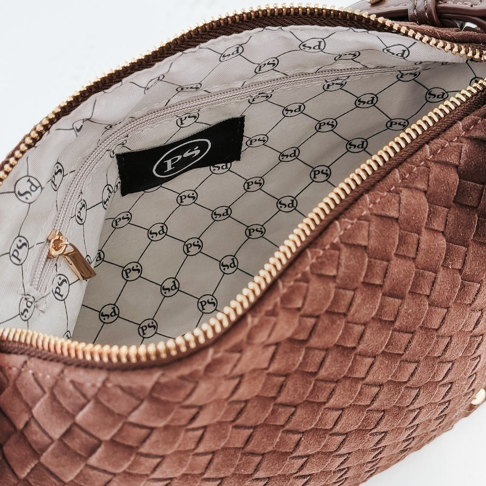 Brown woven suede hobo bag interior, printed lining and top zipper close-up