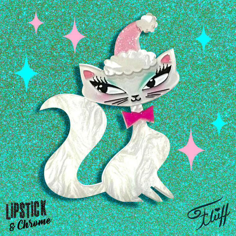 White cat enamel brooch with pink cap and pink bow, teal eye details
