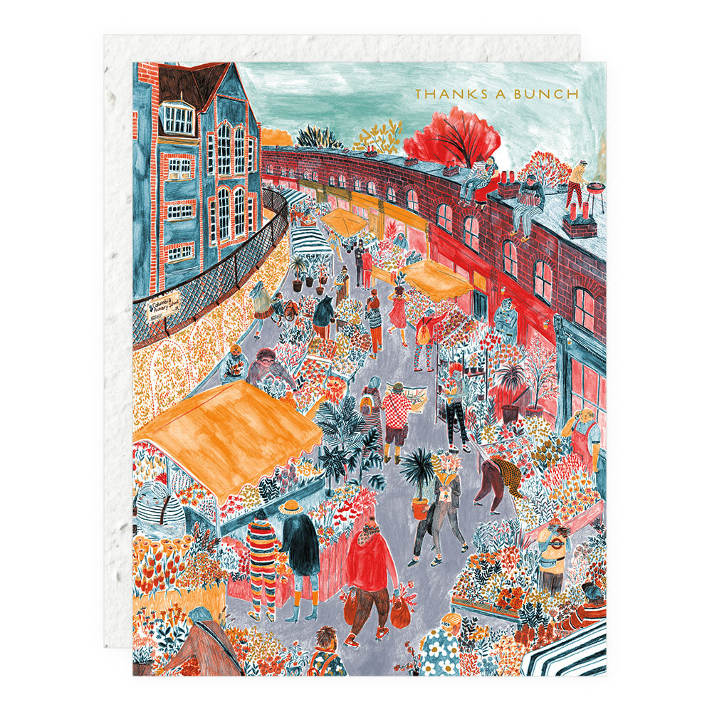 Colorful illustrated greeting card with city street scene and text "THANKS A BUNCH"