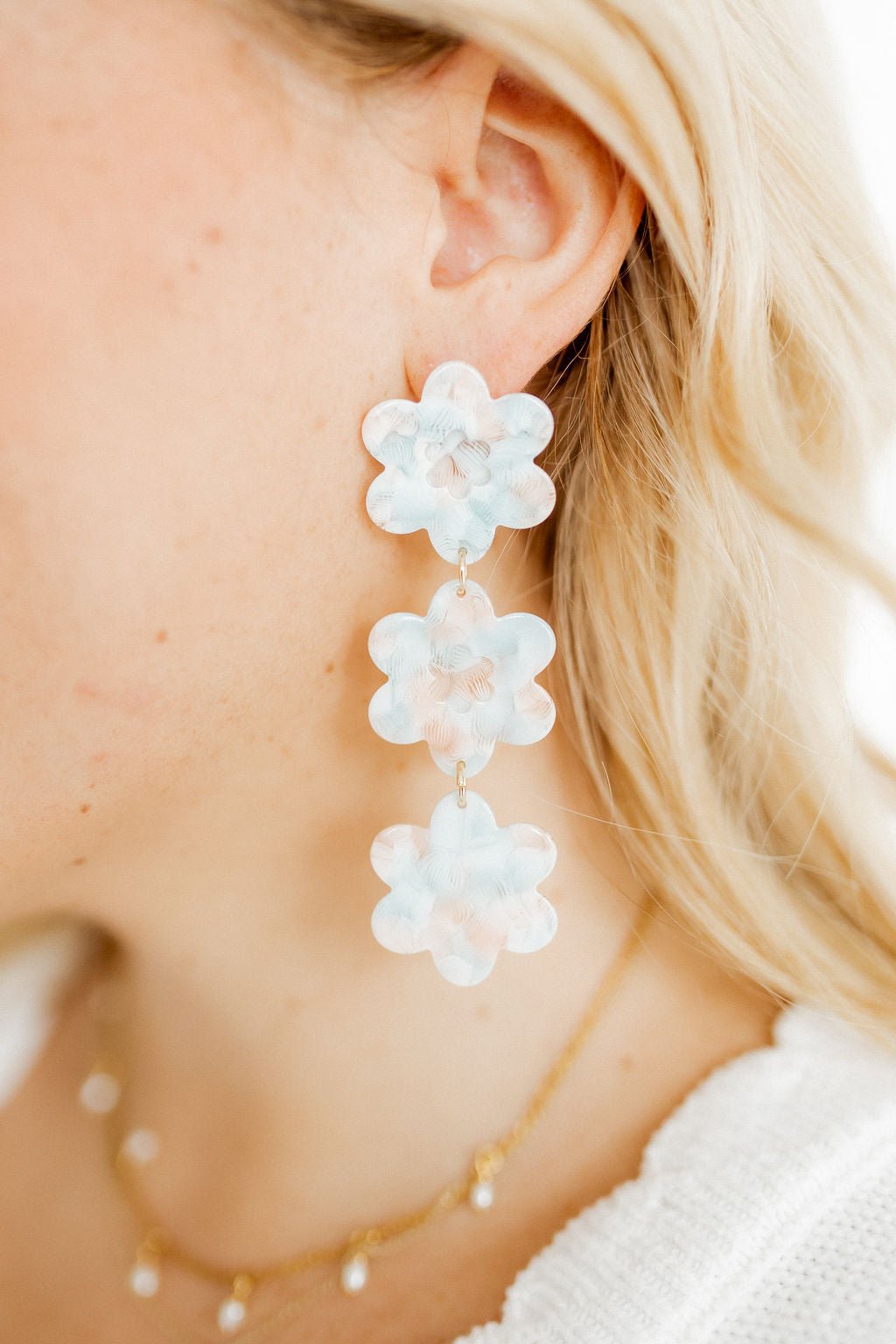 Mint shell statement earrings with three layered flower clusters