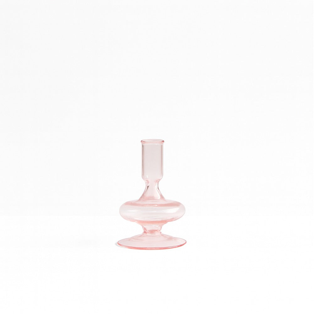 Siri pink glass candle holder with flared base and narrow cylindrical cup