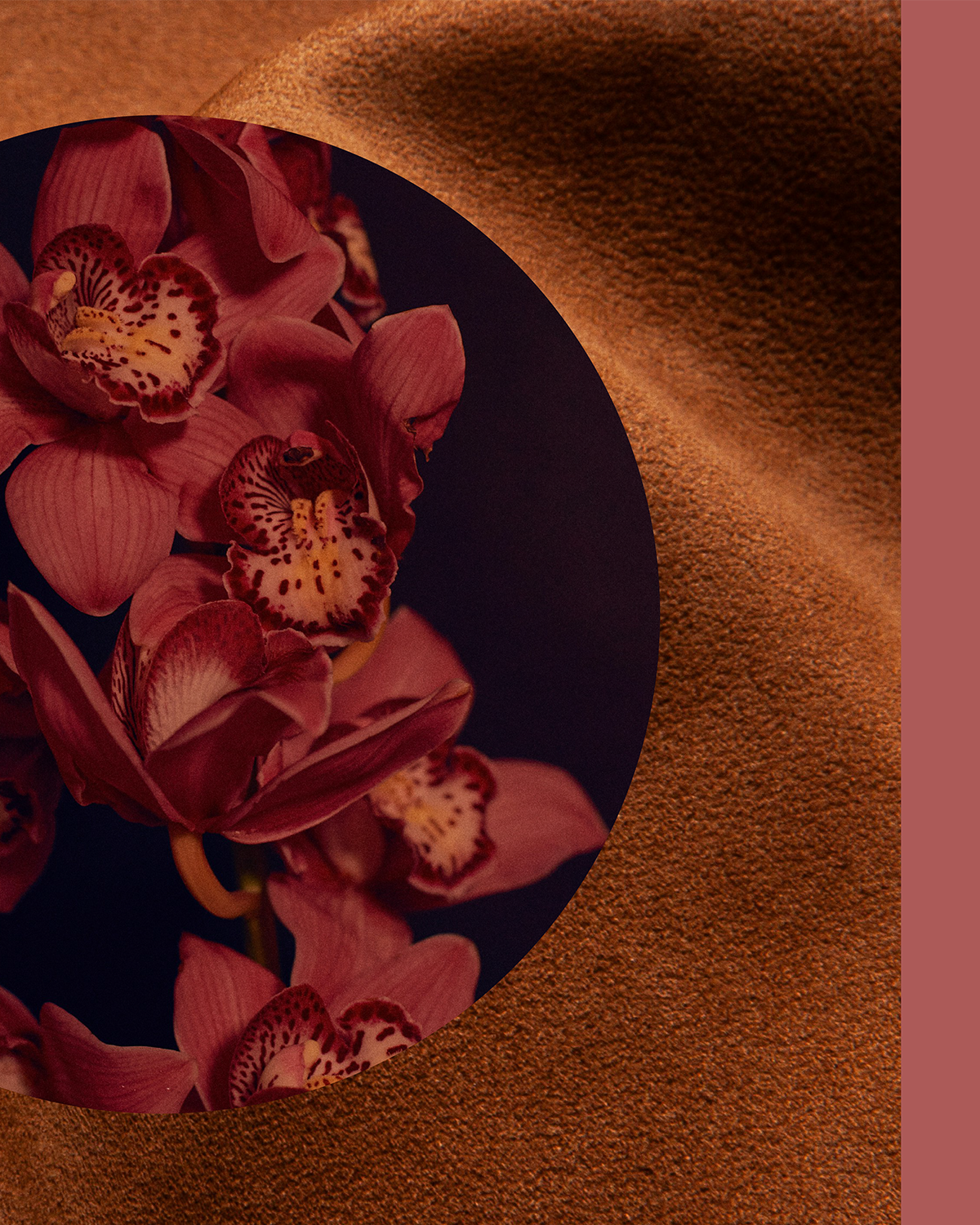 Floral close-up on a circular candle label, with warm-toned blossoms