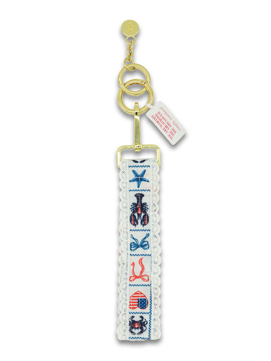 Lobster patch lace keyfob with light blue embroidered lobster design and gold keyring