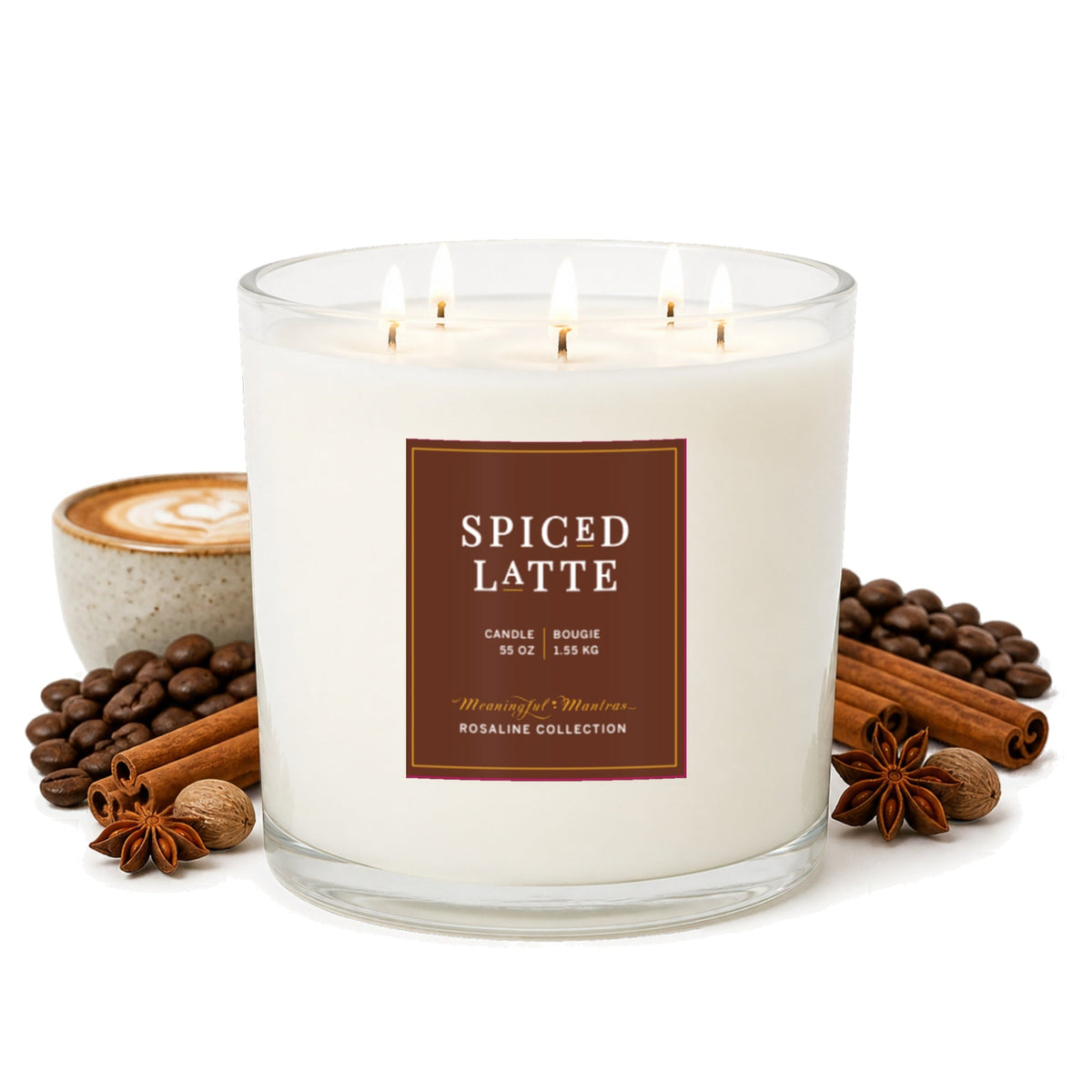 Spiced Latte candle in a clear glass jar with four lit wicks
