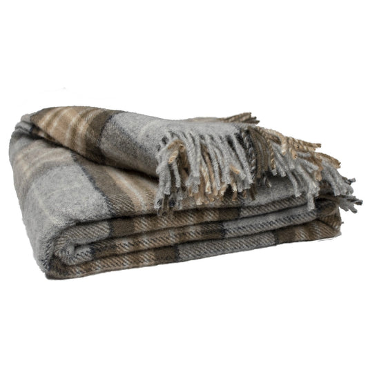 Folded plaid wool throw with fringes, gray, tan, and beige stripes