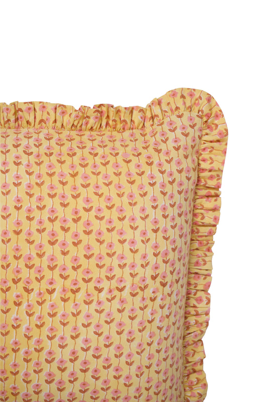 Yellow floral blockprint pillow cover with ruched side edge and ruffle trim