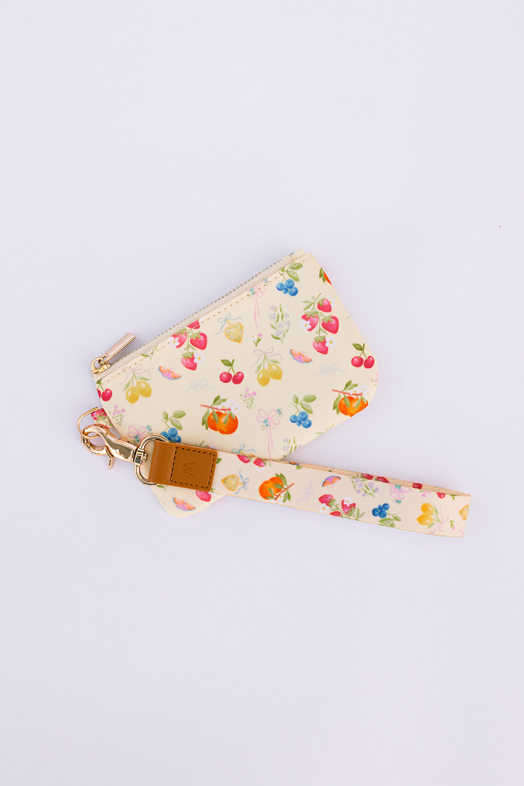 Berry-print wrist lanyard with brown clasp, gold keyring, and slim strap