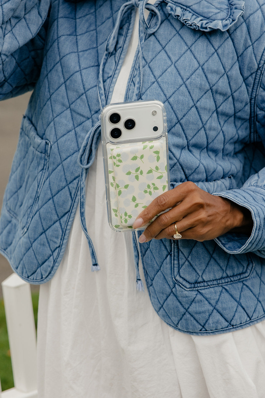 5000mAh Power Boost portable charger in leaf-pattern phone case with hand strap