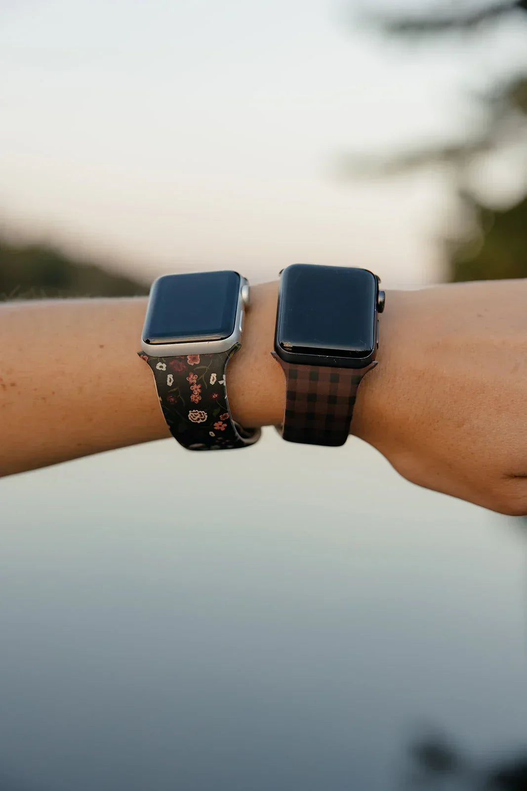 Floral watch band on wrist with square smartwatch display