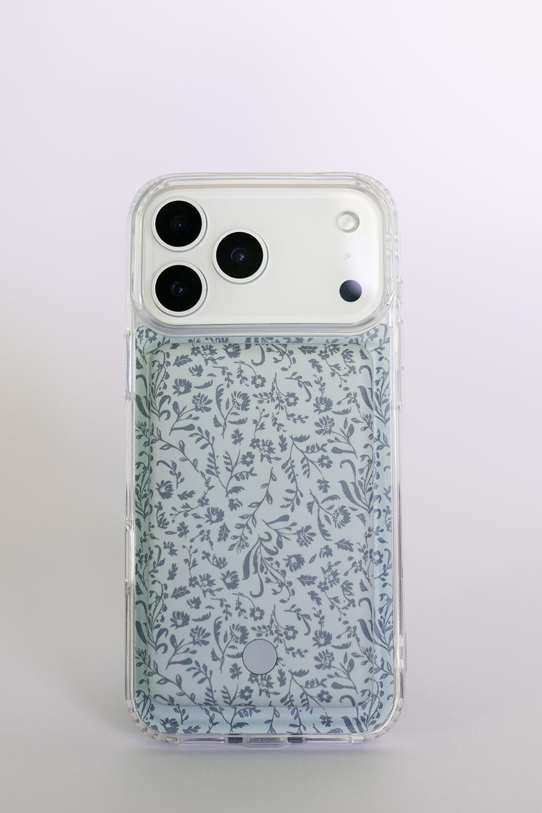 Light blue floral phone case with clear protective cover and side button