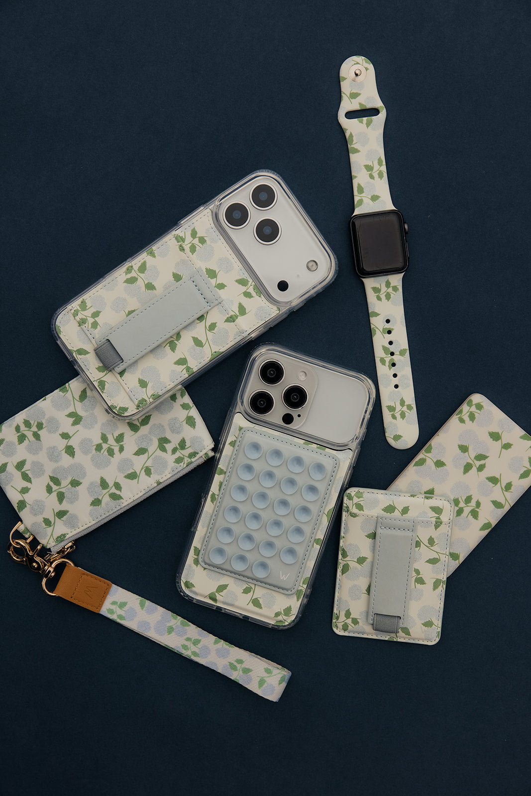 Set of 5000mAh Power Boost portable chargers with leaf pattern pouches and straps