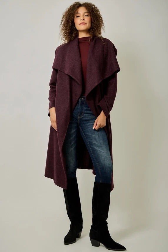 Burgundy long shawl-collar coat with draped lapels and waist tie belt