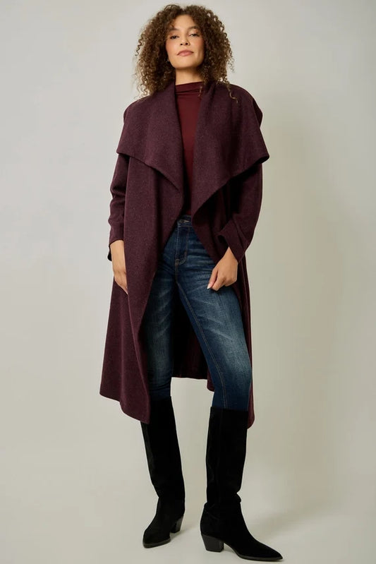 Burgundy long shawl-collar coat with draped lapels and waist tie belt