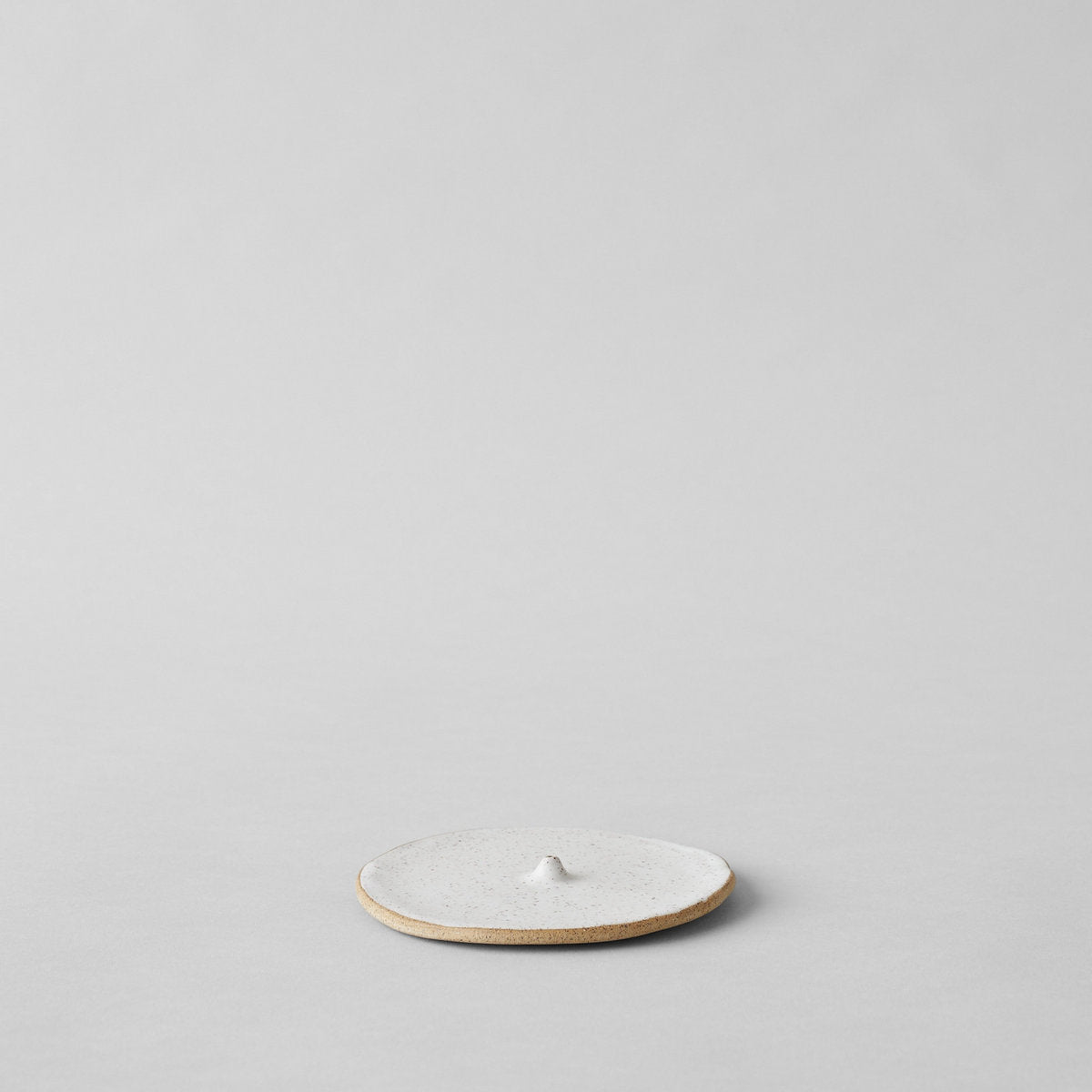 Speckled incense holder round base with center opening