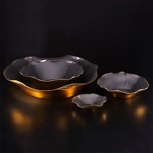 Ruffled graphite bowl with black glossy interior and gold outer base