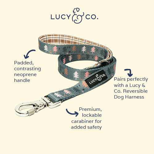 Tree-print dog leash with padded contrasting handle and lockable carabiner clasp.