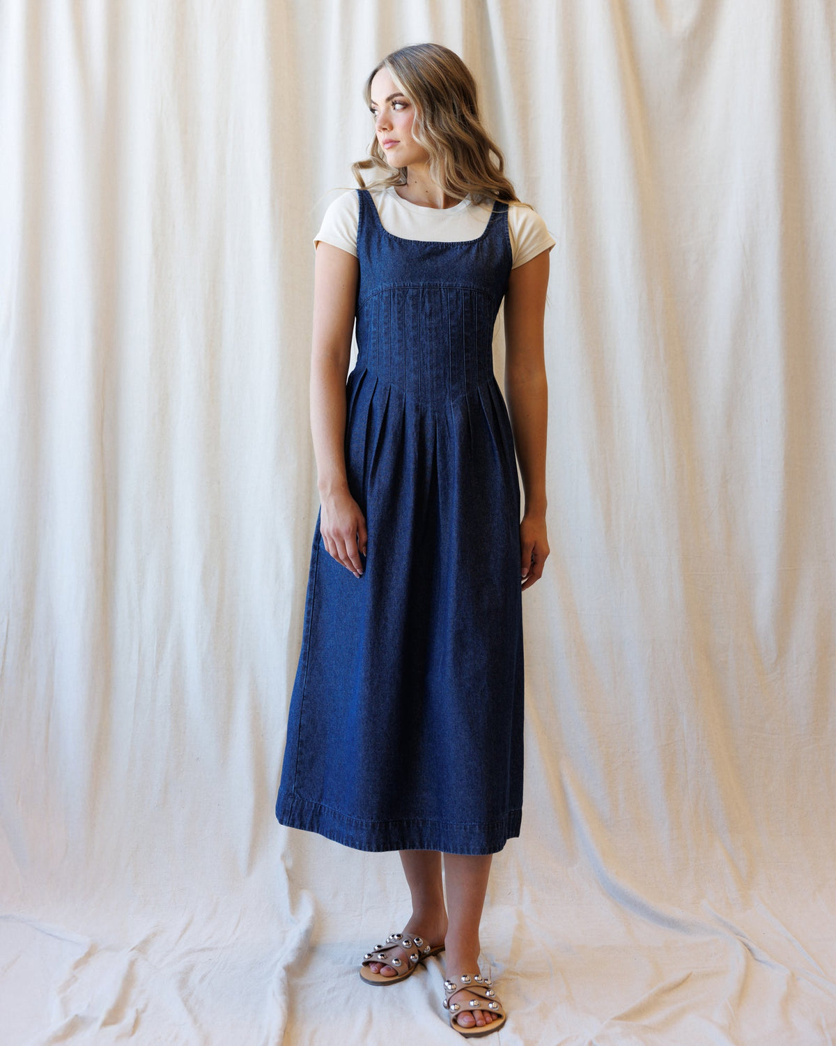 Medium blue wash denim midi dress, sleeveless square neck, gathered waist and skirt