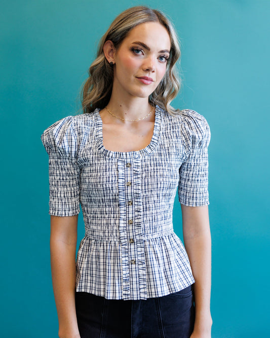 Plaid short-sleeve peplum blouse with square neckline and gold button placket