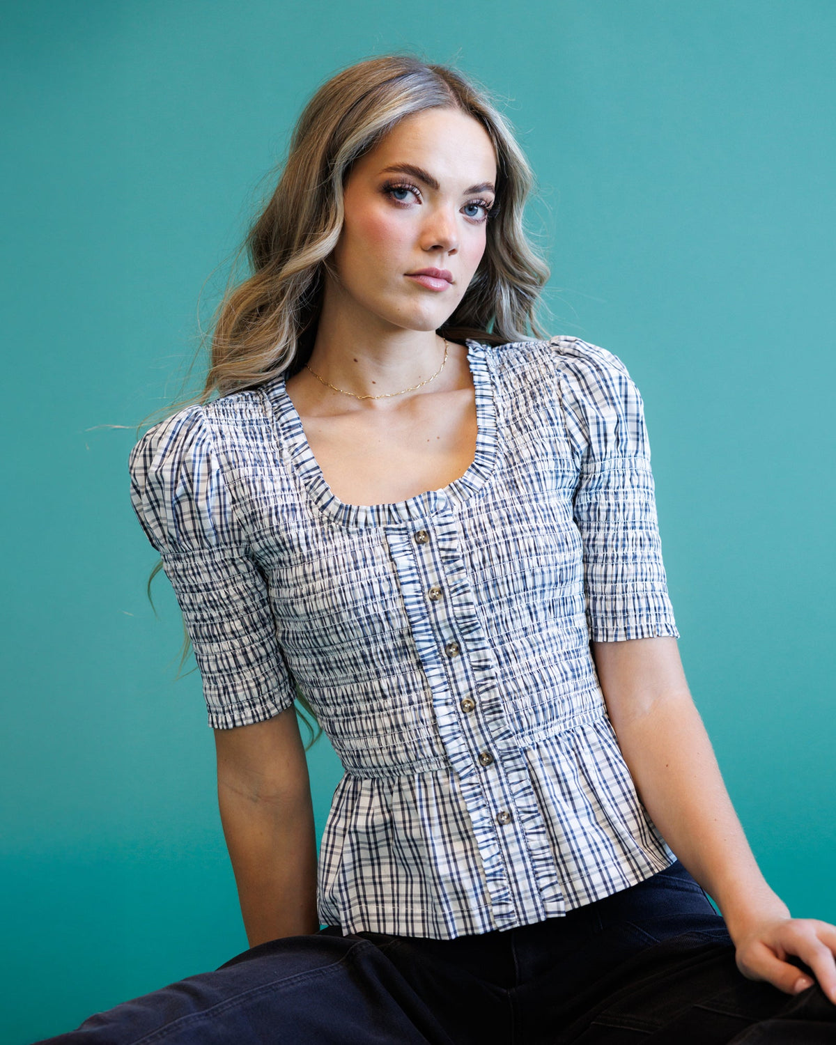 Plaid short-sleeve peplum blouse with square neckline and button front