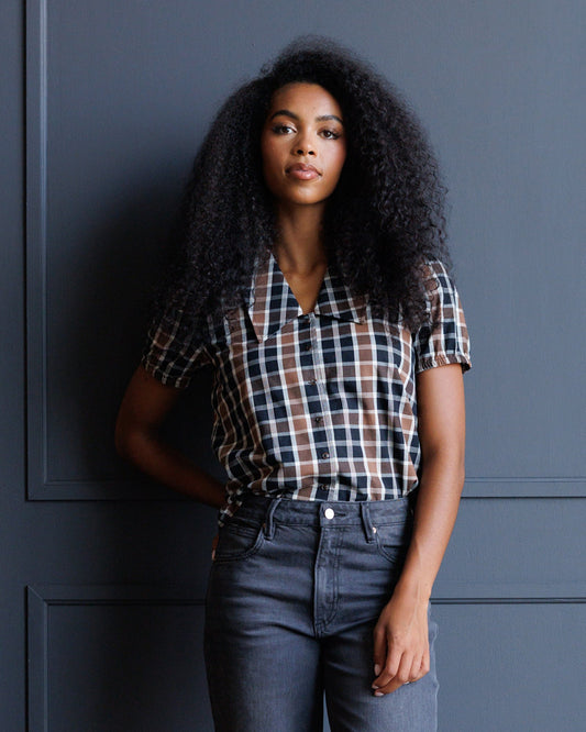 Black, tan, and white plaid short-sleeve button-down shirt with collar