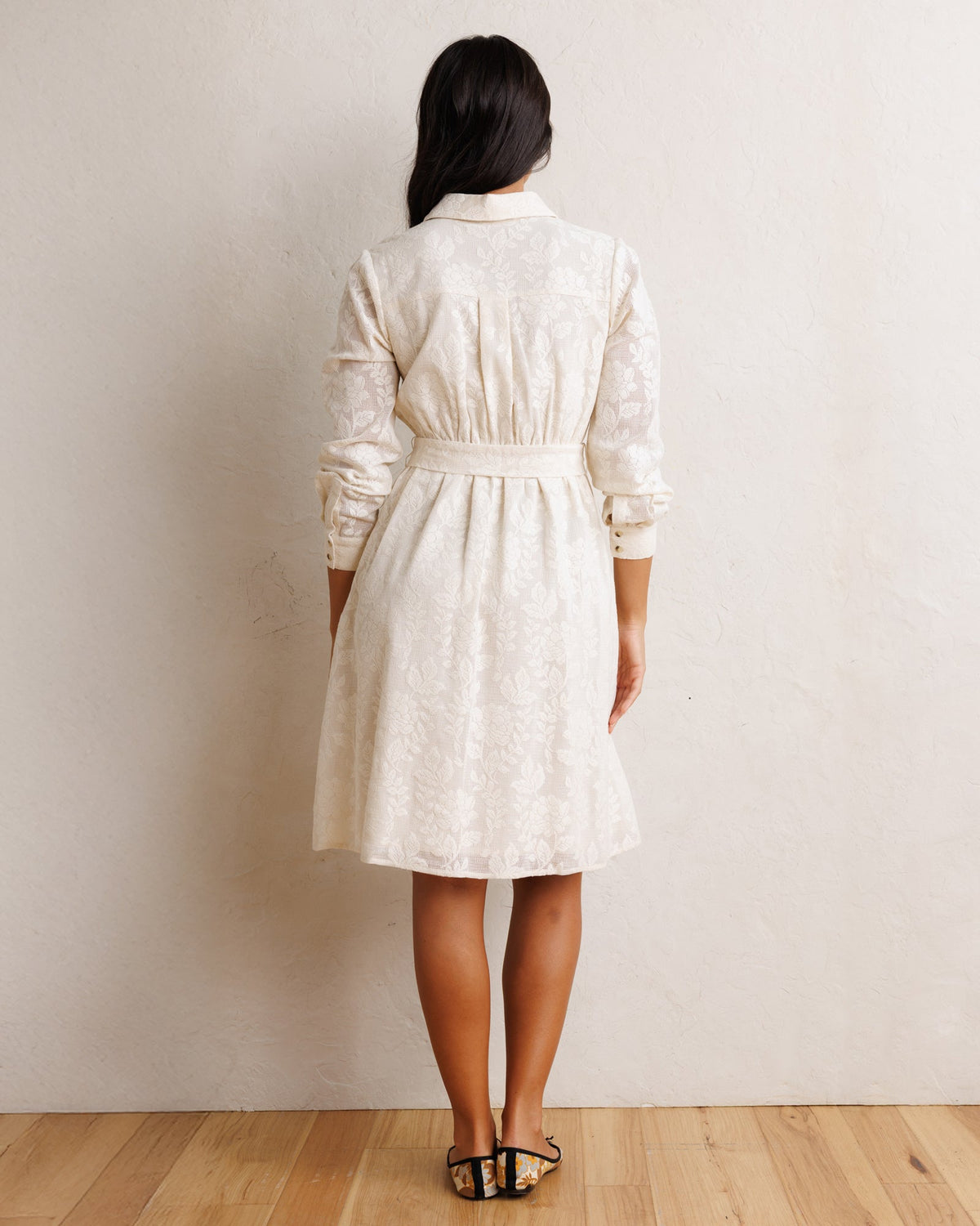 White button-back shirt dress with gathered waist tie and long sleeves, midi length