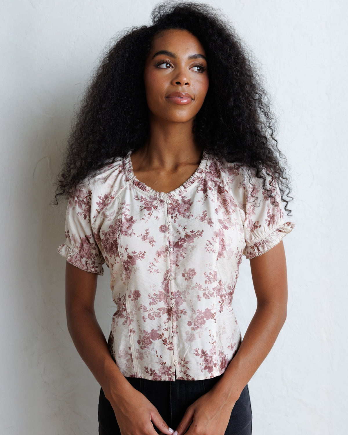 La Vie En Rose top in pale floral print with puff sleeves and gathered neckline.