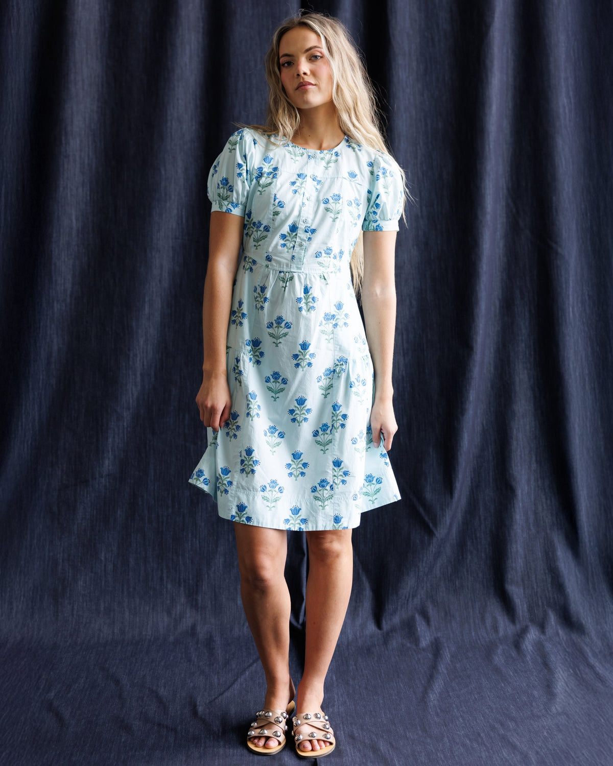 White floral print dress with blue puff sleeves and square neckline