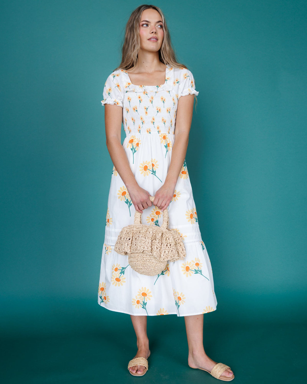 White floral tiered midi dress with short puff sleeves and scalloped hem