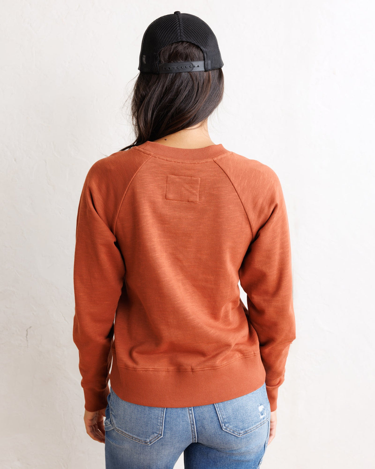 Copper brown crewneck sweatshirt, back view, straight hem
