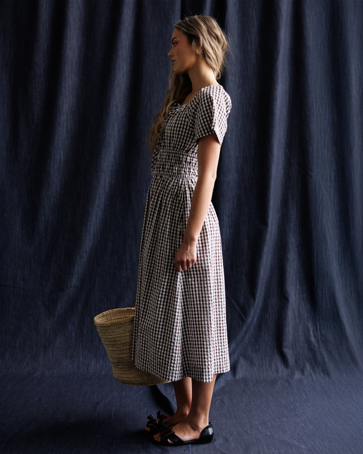 Maybelle dress in gingham with puff sleeves and gathered waist, side view