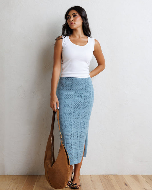 Smoke blue knit midi skirt with geometric texture and front slit